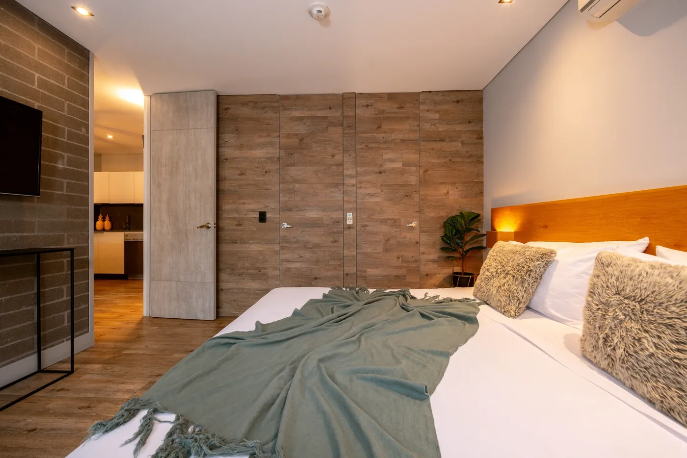 Bedroom in a one-bedroom furnished apartment at Loma Verde, Medellín