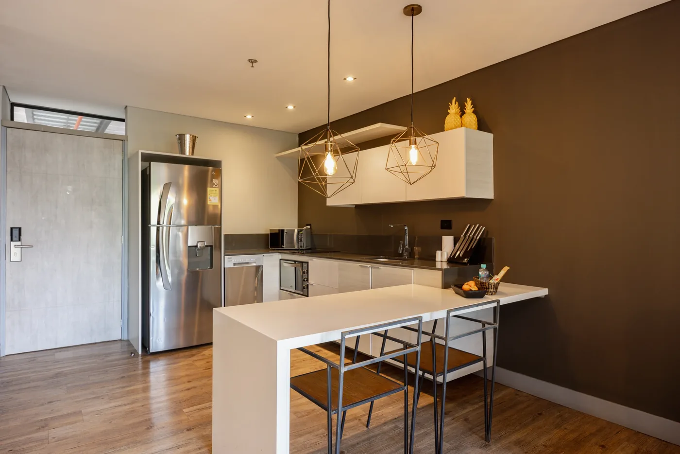 Kitchen island in a two-bedroom furnished apartment at Loma Verde, Medellín