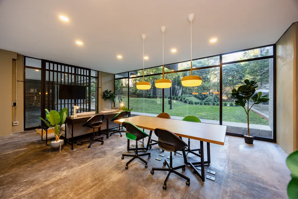 Dedicated workspace room with desks and garden views for remote work at Loma Verde, El Poblado, Medellín