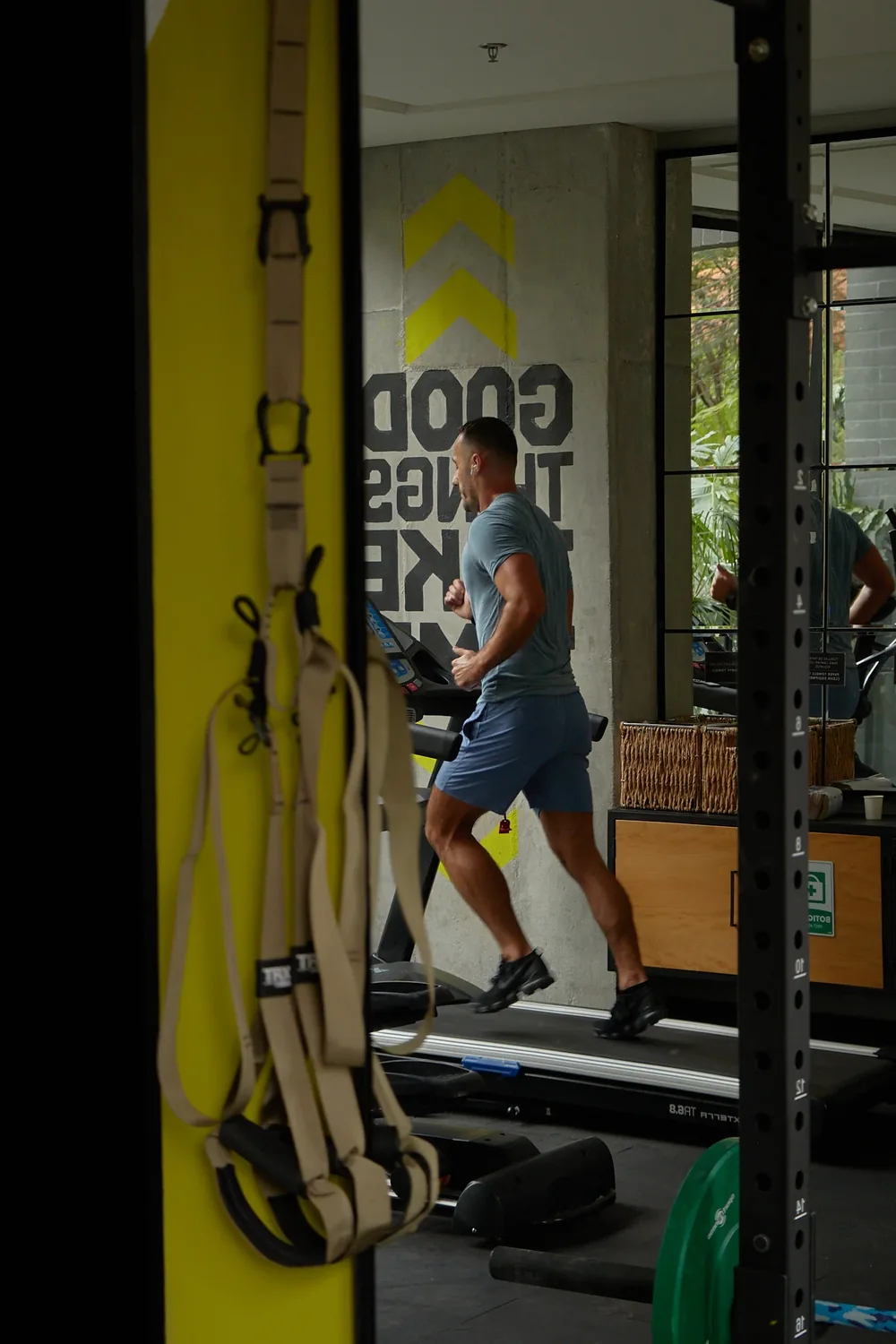 Running on the treadmill in the gym at Loma Verde, El Poblado, Medellín